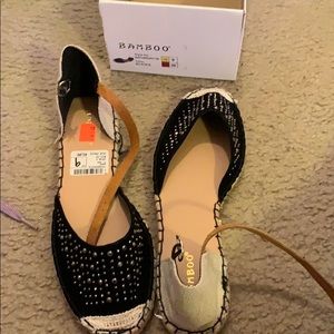 Never worn Black bamboo sandals